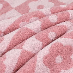 Jacquotha checkered floral pink towels in bathroom decor for a stylish touch.