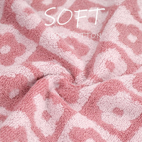 Jacquotha color-rich set on a towel bar enhances home decor.
