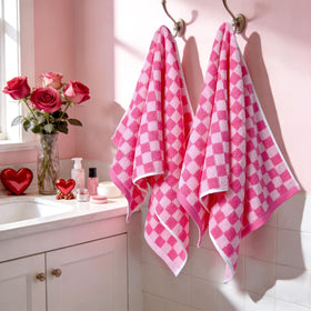Jacquotha hot pink checkered design brightens kitchen decor with playful texture.