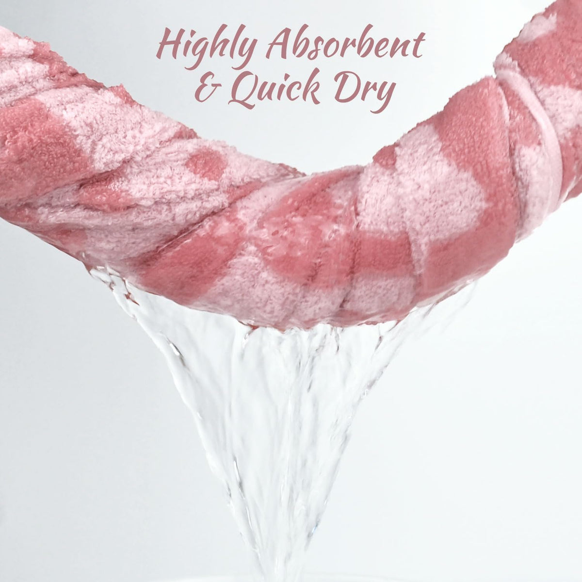Jacquotha pink towels by poolside, ready for drying after water fun.