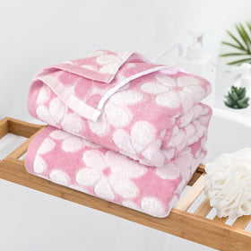 Jacquotha six-petal flower jacquard decorative towel design enhances bathroom decor.
