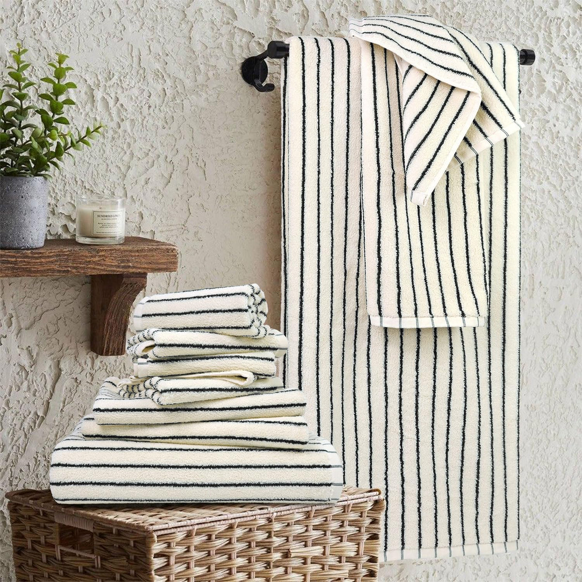 Jacquotha striped towels hanging to showcase modern bathroom decor