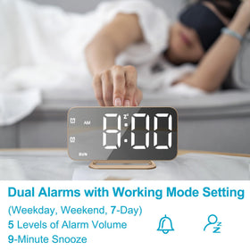 JALL mirror clock includes memory function to retain settings after power outages.