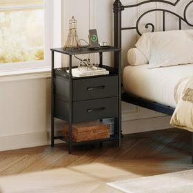 JARHETUN fabric drawers close-up showing organized bedside storage