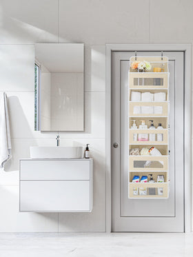Five large pockets plus mesh sides maximize behind-the-door storage options.