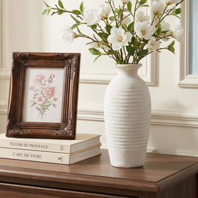 Jaxoriel rustic vase features a non-slip base to protect tabletops.