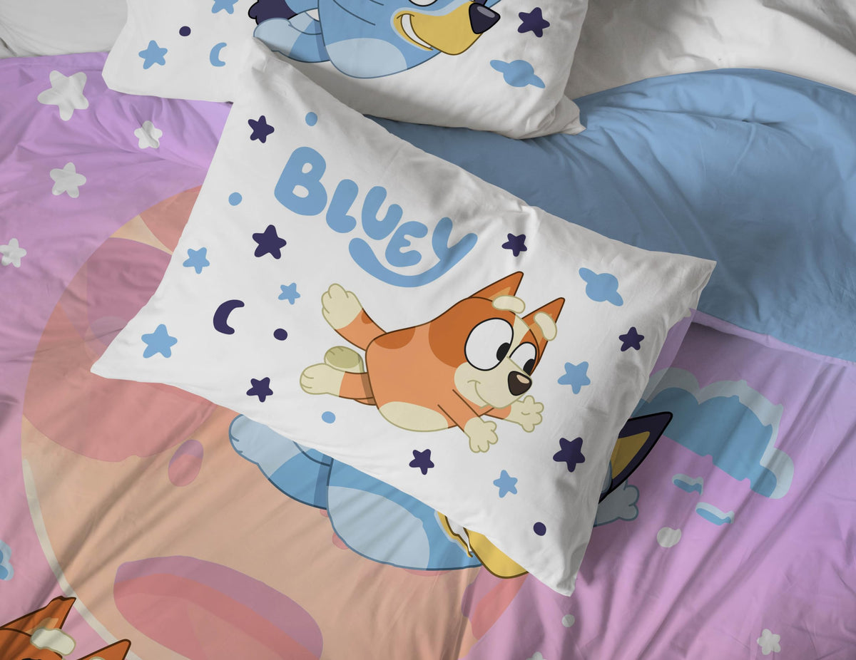 Gift-ready Bluey & Bingo bedding rolled for easy storage and travel