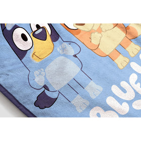 Jay Franco Bluey hero throw on bed adds cozy decor.