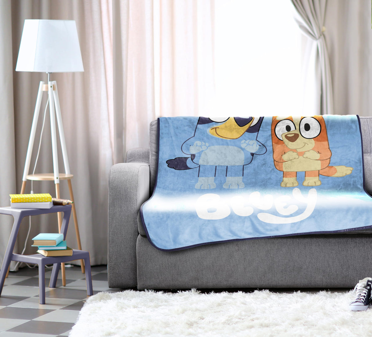 Jay Franco Bluey hero throw folded neatly for easy storage and travel.