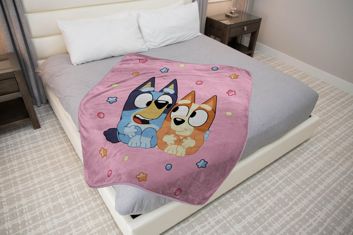 Folded Jay Franco Bluey plush throw showing compact warmth