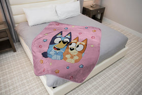 Folded Jay Franco Bluey plush throw showing compact warmth