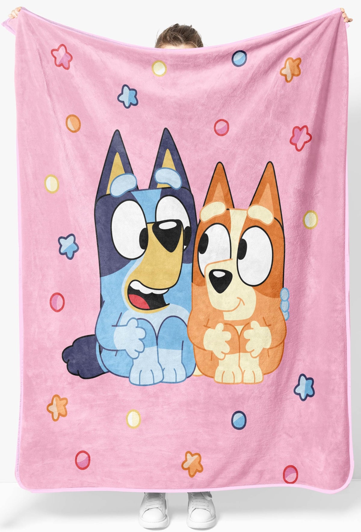 Jay Franco Bluey plush throw on sofa for cozy movie nights