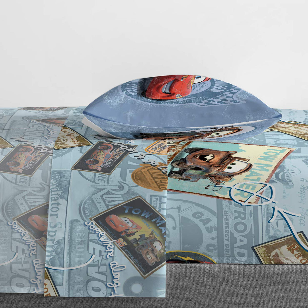 Jay Franco Cars Lightning McQueen flat sheet shown with generous coverage for easy bed-making