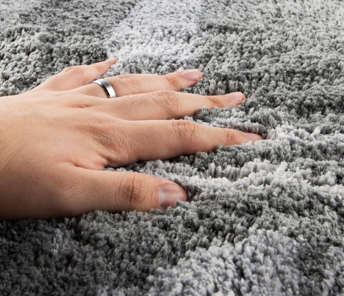 Jay Franco Death Star accent rug showing latex backing for secure placement.
