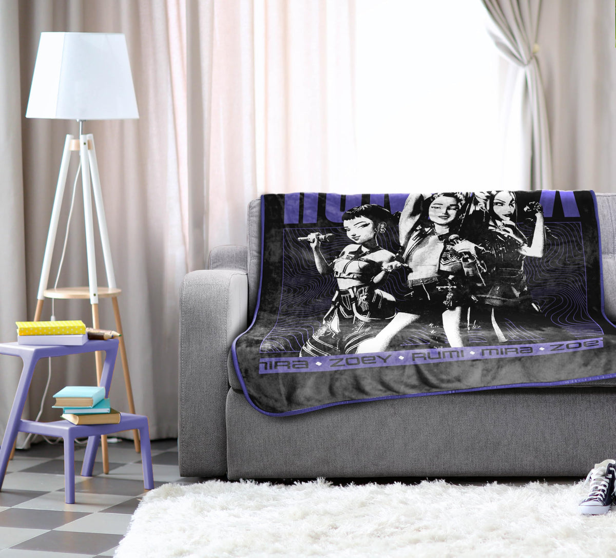 Jay Franco Demon Hunters Huntrix blanket on couch ideal for movie nights