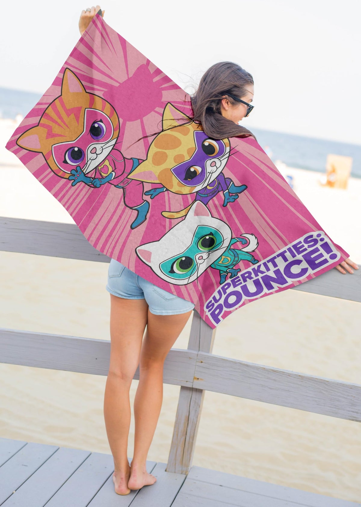 Jay Franco Disney Super Kitties Ginny print towel brings bright color to pool days.