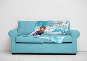 Jay Franco Frozen throw on a sofa enhances living room color.