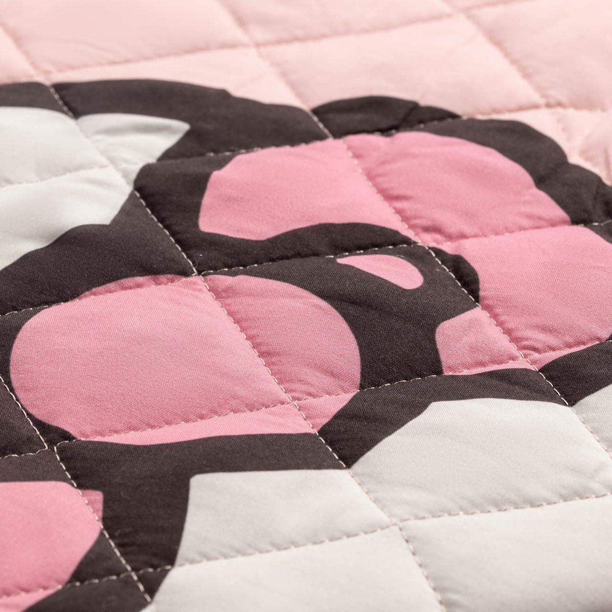 Hello Kitty twin bedding in a cheerful, kid-friendly bedroom setup