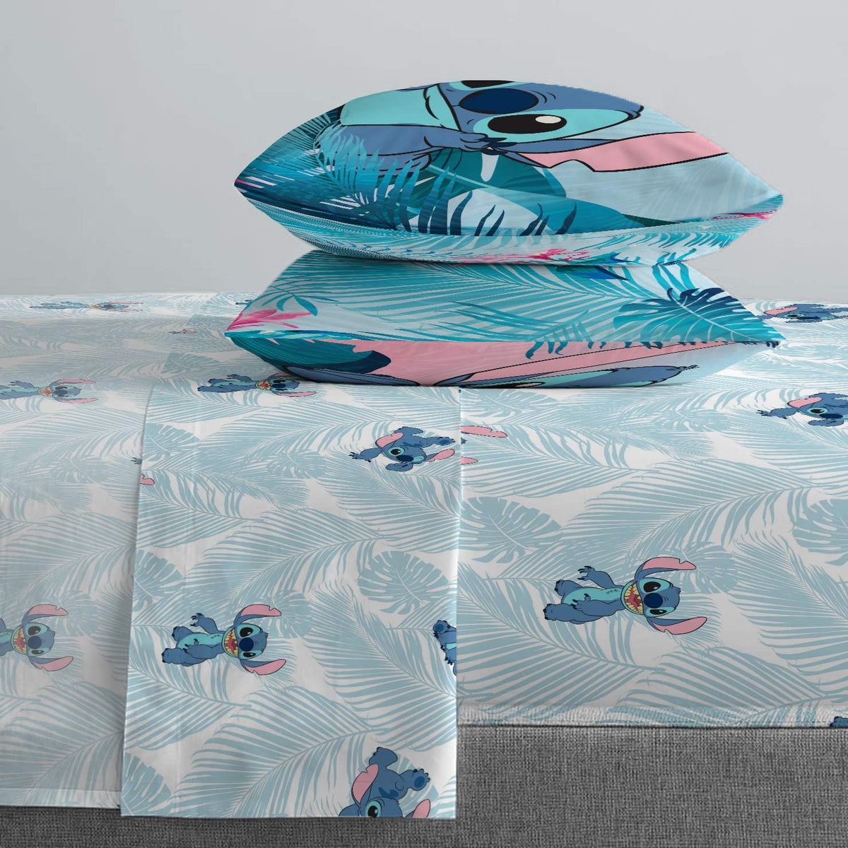 Jay Franco Lilo & Stitch teal pattern close-up on bedding