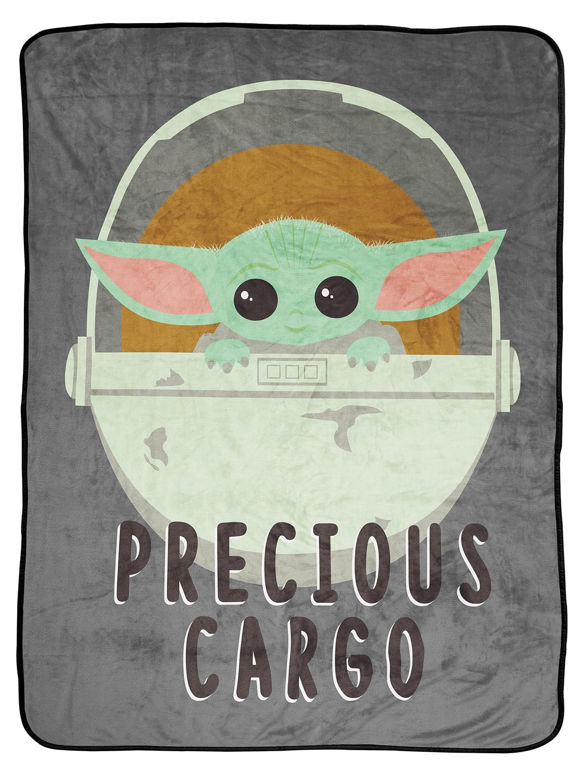 Jay Franco Mandalorian Baby Yoda in a spaceship on a soft throw for cuddling.