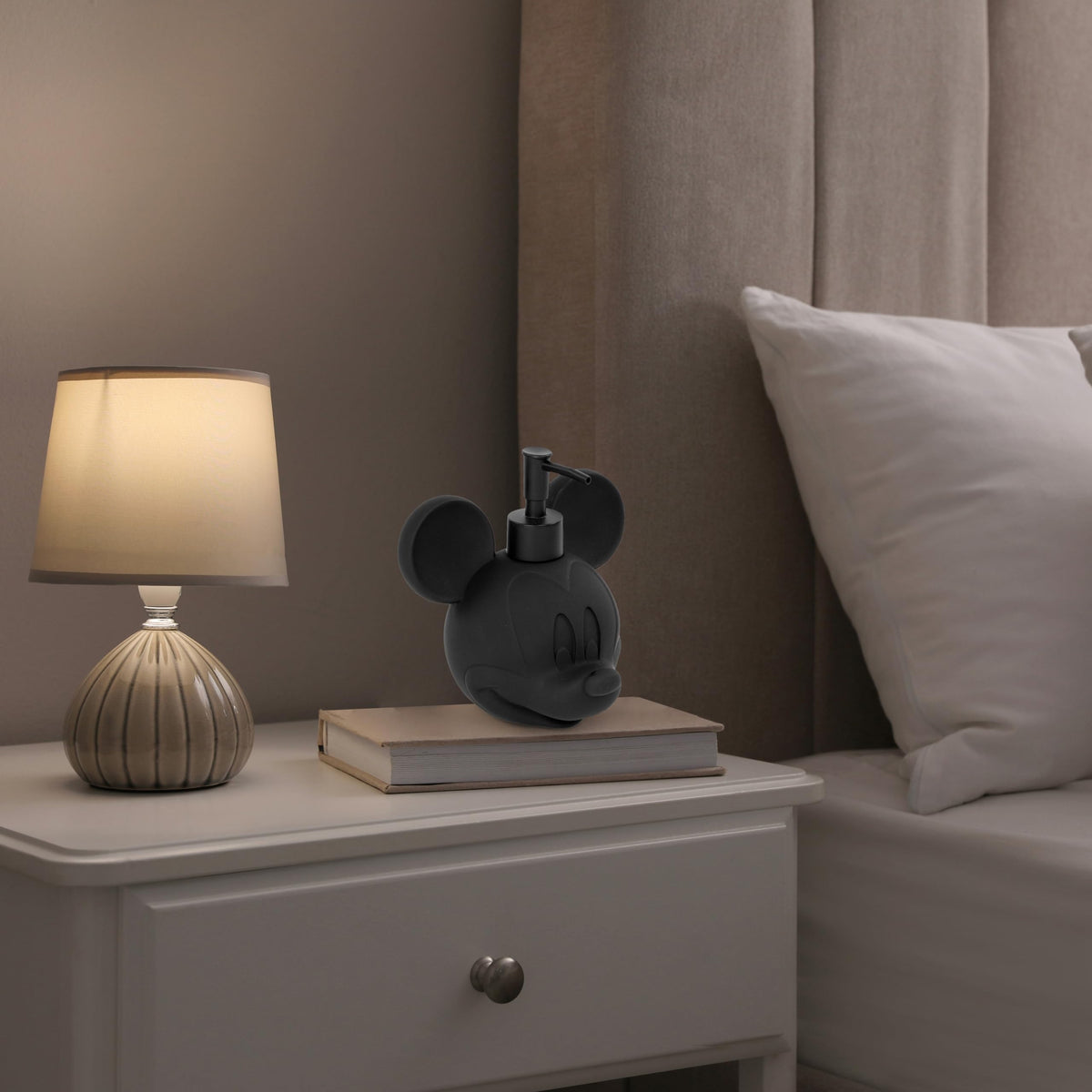Jay Franco Mickey Mouse lotion pump closeup highlighting durable black resin.