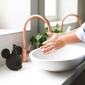 Jay Franco Mickey Mouse soap dispenser back view with smooth black resin finish.
