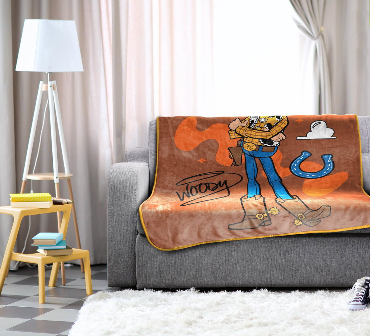 Jay Franco microfiber throw offers soft texture and lightweight warmth for everyday lounging.