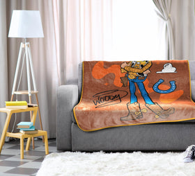 Jay Franco microfiber throw offers soft texture and lightweight warmth for everyday lounging.