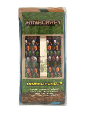Jay Franco Minecraft blue curtains come packaged roll-up for travel.