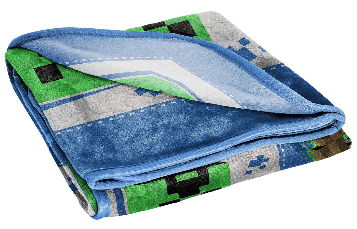 Jay Franco Minecraft plush throw makes a gift for young fans.