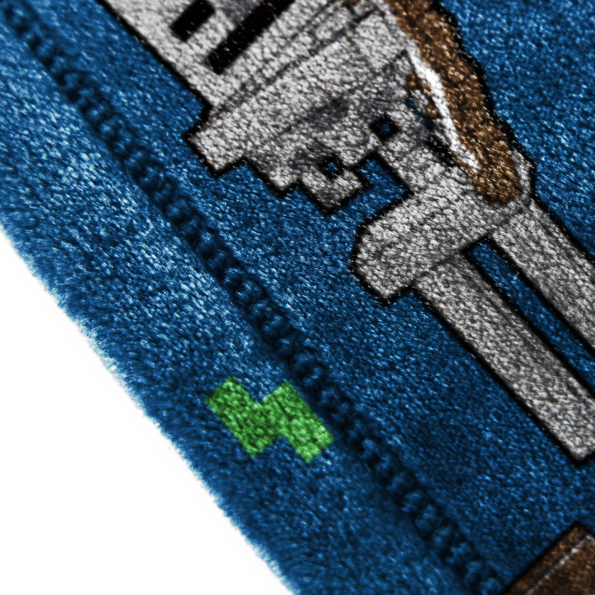 Jay Franco Minecraft plush throw adds Minecraft-themed decor to a kids' room.