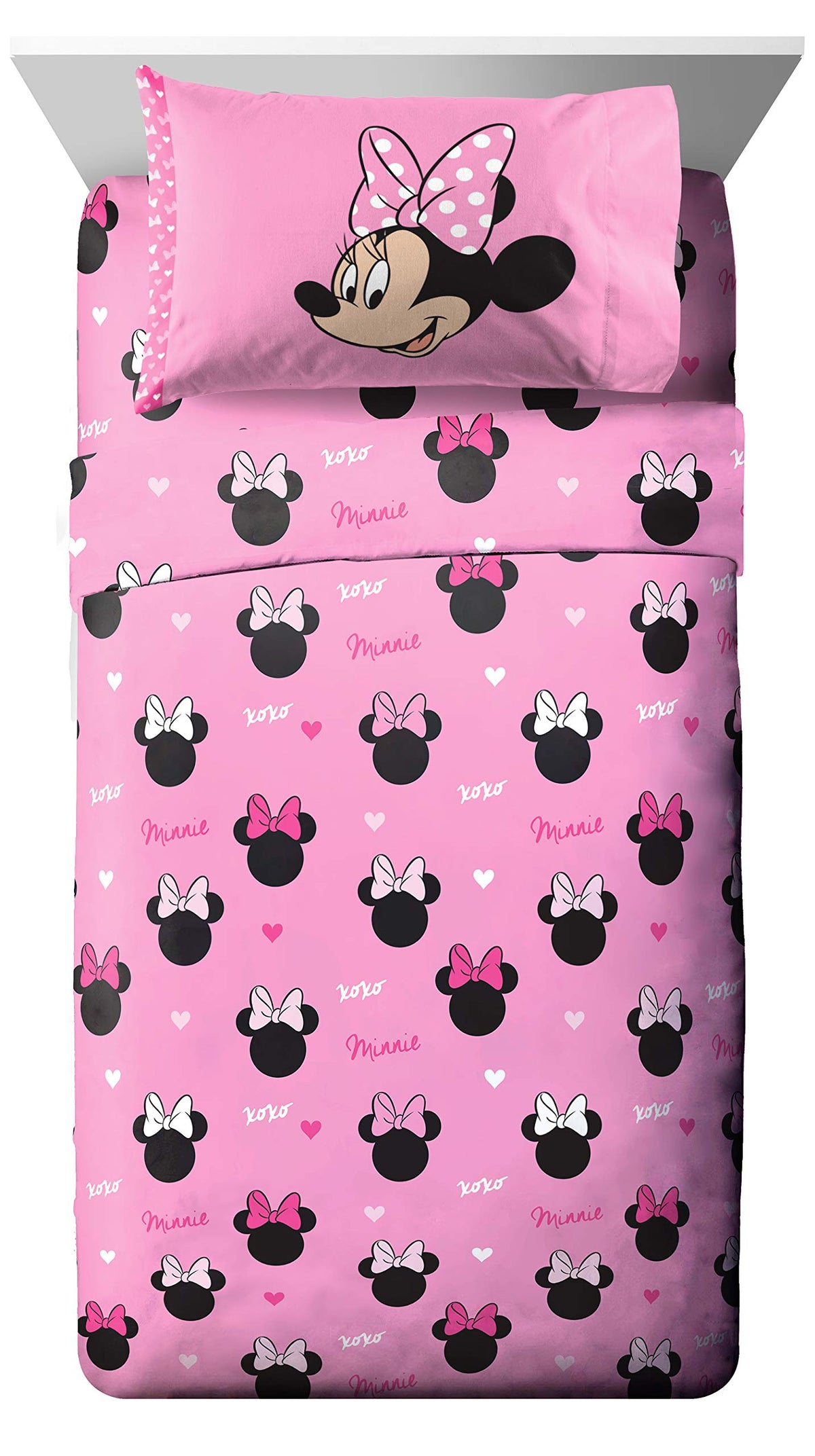 Closeup of Jay Franco Minnie Mouse Hearts N Love pillowcase design.