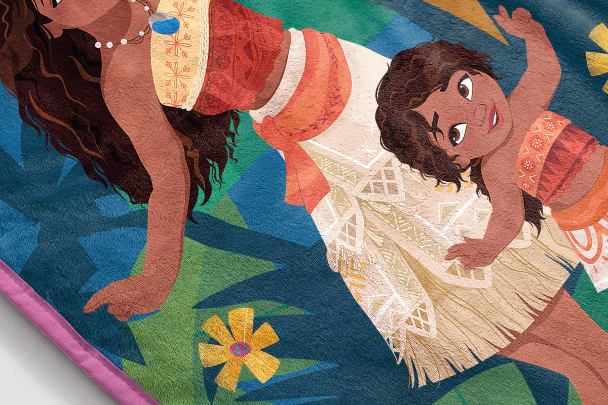 Machine-washable Moana blanket preserves softness and bold colors.