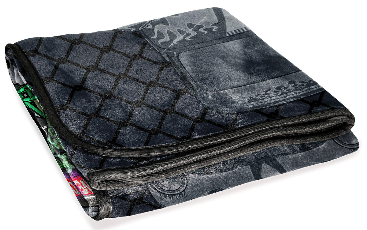 Grave Digger design on Jay Franco Monster Jam throw enhances kid's room.