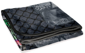 Grave Digger design on Jay Franco Monster Jam throw enhances kid's room.