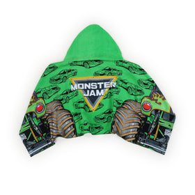 Bright green flames and giant tires decorate the towel for energetic kids.