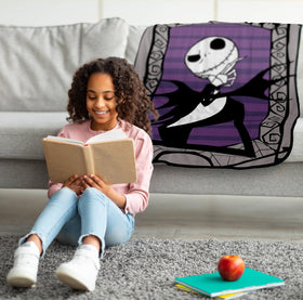 Jay Franco Nightmare Before Christmas throw shows detailed Halloween Town artwork for vibrant decor.