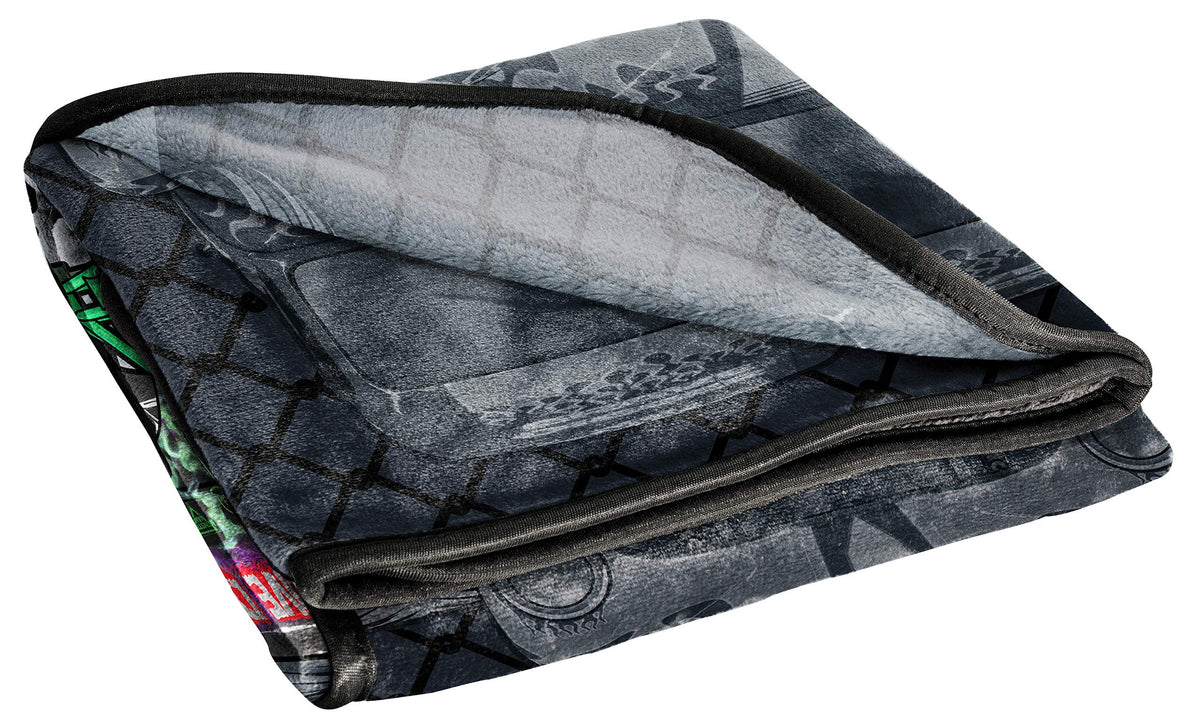 Compact roll for travel and easy storage of Jay Franco throw.
