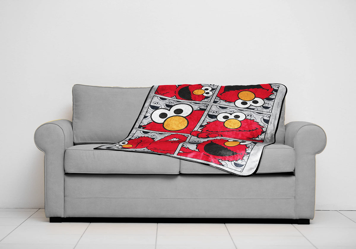 Jay Franco Sesame Street machine-washable throw simplifies cleanup.