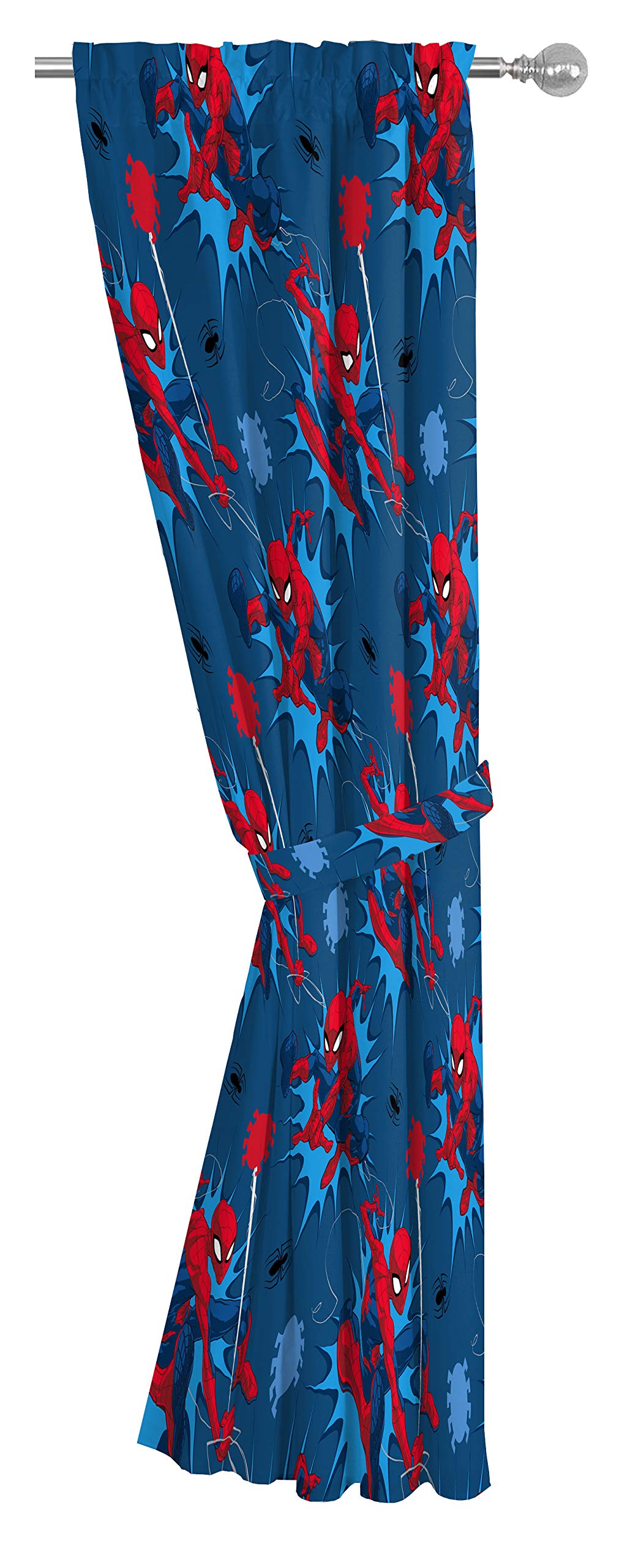 Light-filtering Spider-Man drapes from Jay Franco create a cozy atmosphere.