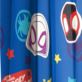 Jay Franco Spidey curtains in a kid's room with playful blue theme.