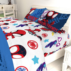 Jay Franco Spidey and Friends kids sleeping with vibrant bedding.