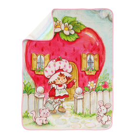 Jay Franco Strawberry Shortcake throw pattern close-up, adds playful color to bed or lounge.