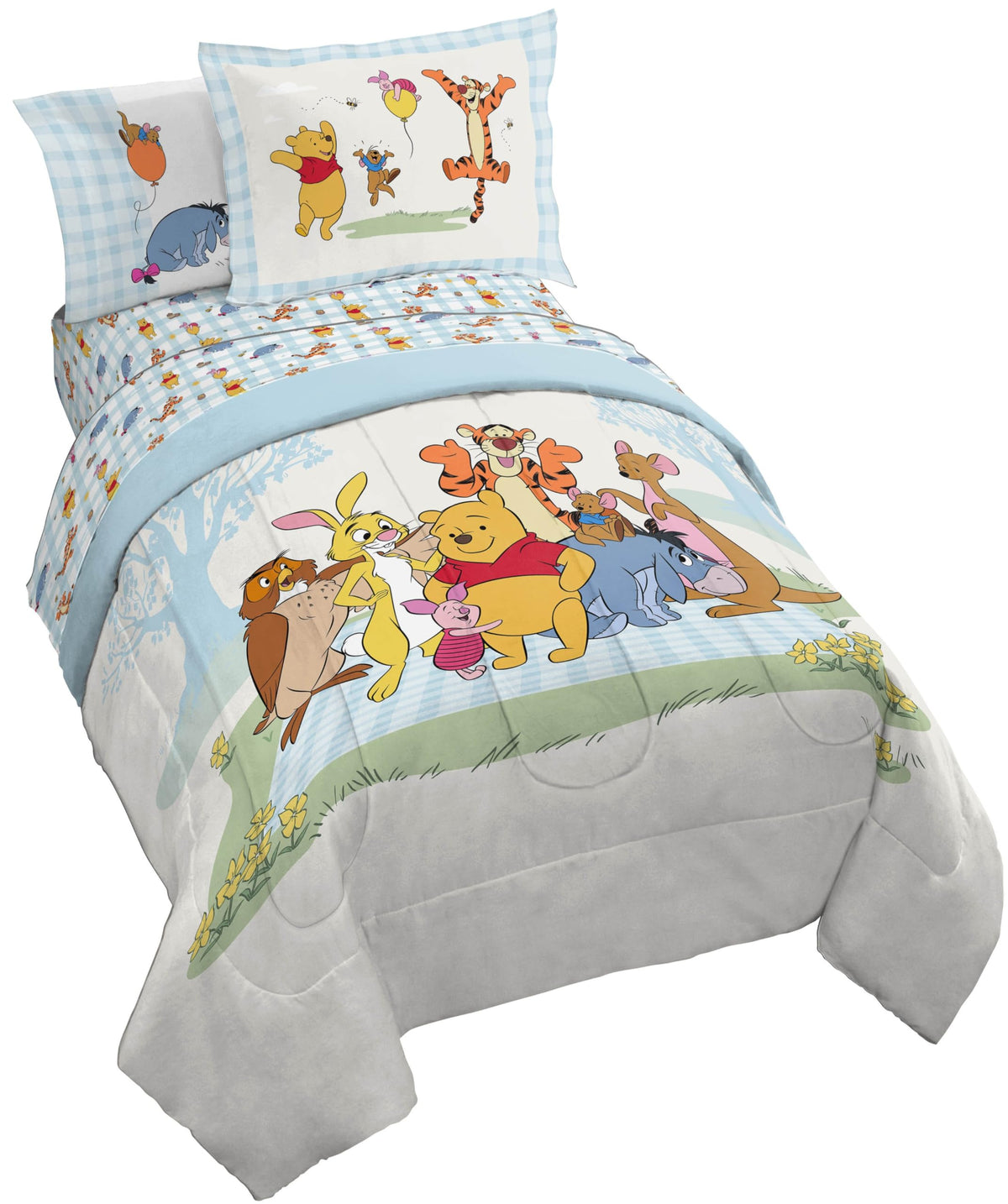 Jay Franco Winnie the Pooh 5-piece twin bed set, cozy comforter close-up for kids' rooms.