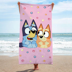 Family uses Bluey & Bingo towel for bath or pool time