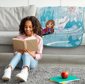 Jay Franco Disney Frozen blanket on bed for cozy lounging.