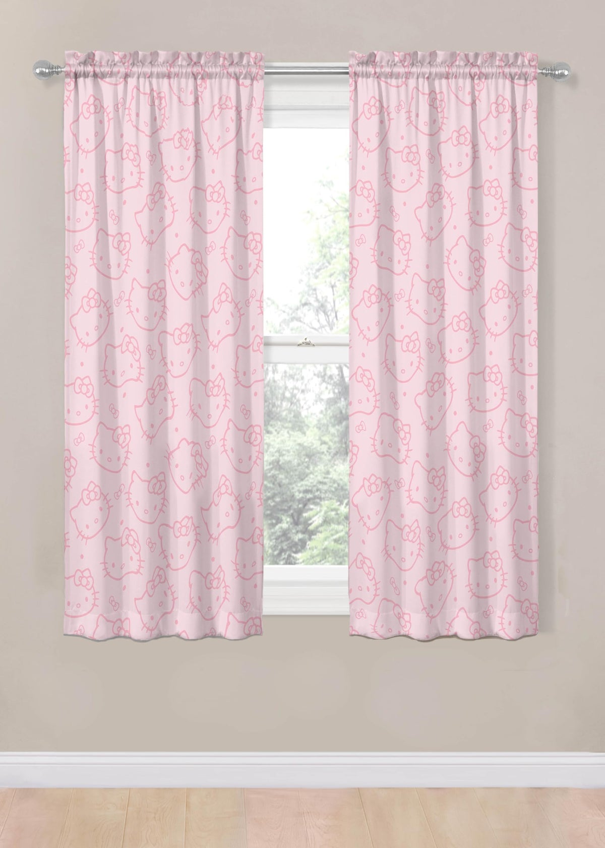 Jay Franco Hello Kitty pink curtains full panel view in a girl’s room