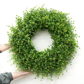 JDKPK wreath displayed on porch creates welcoming, all-season ambiance.