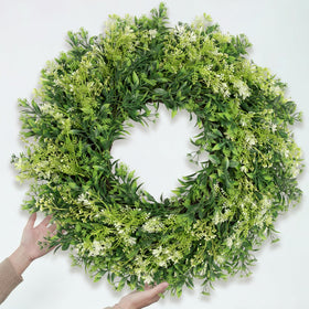 JDKPK white and green berries add delicate accent to any doorstep.