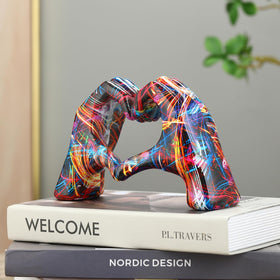 JDPEYI Heart Hands statue on a shelf elevating room ambiance